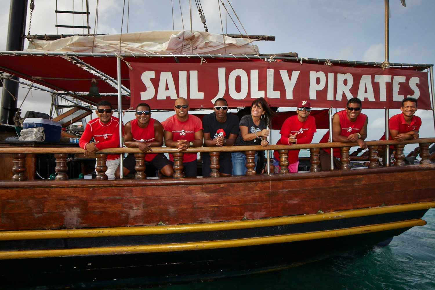 a group of people on a boat in the water